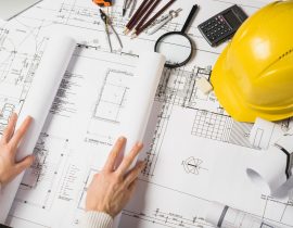 crop-architect-opening-blueprint